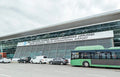 Shota Rustaveli Tbilisi International Airport (TBS) terminal exterior view from the pickup area where our private transfers wait