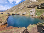 Truso Valley mineral lake natural landmark and scenic day trip destination in Kazbegi, Georgia