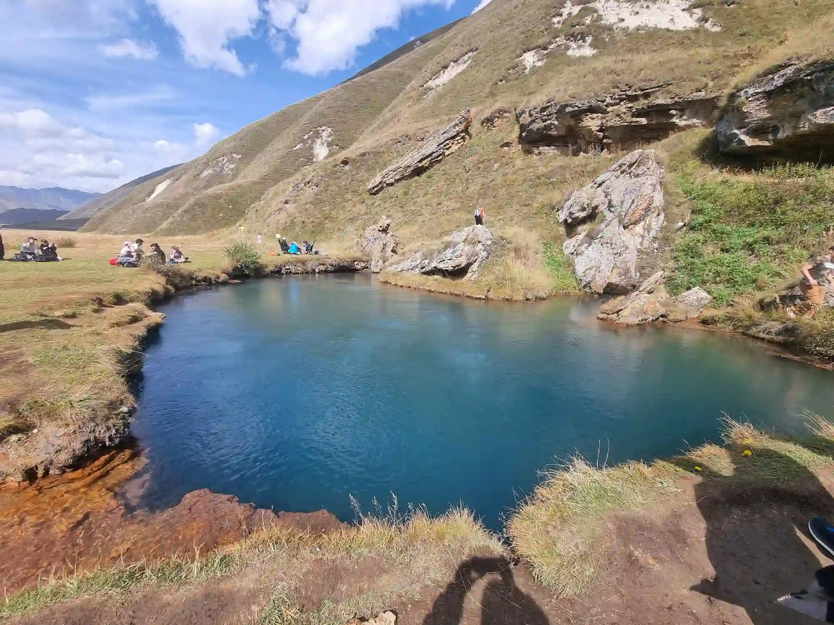 Truso Valley mineral lake natural landmark and scenic day trip destination in Kazbegi, Georgia