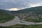 Natural landscape view showing the famous confluence where the Mtkvari and Aragvi rivers meet near Mtskheta