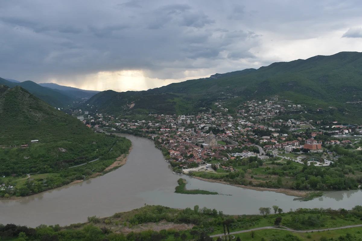 Natural landscape view showing the famous confluence where the Mtkvari and Aragvi rivers meet near Mtskheta