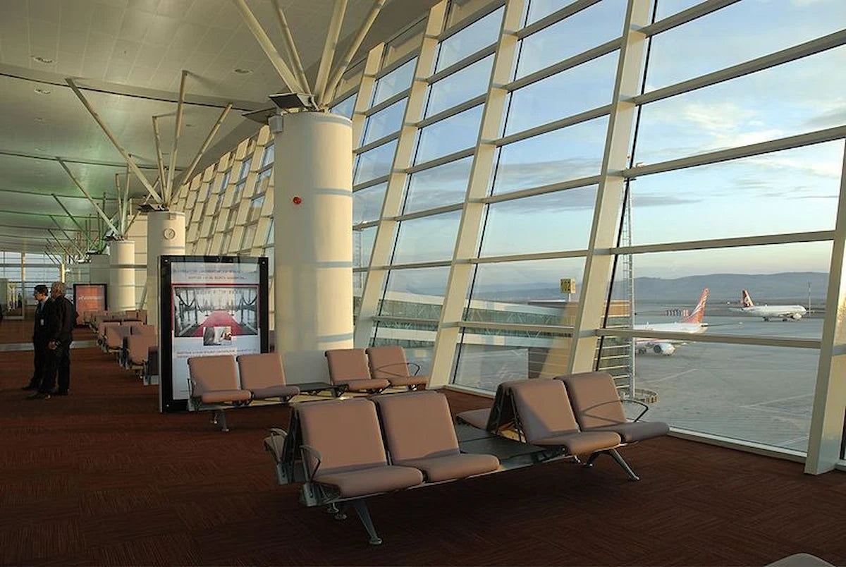 Modern departure lounge at Tbilisi International Airport (TBS) where Georgi Travels passengers relax before their flight after a stress-free airport drop-off.