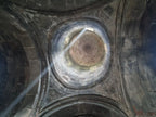Historic stone dome interior architecture of Gergeti Trinity Church during a private cultural sightseeing tour in Kazbegi, Georgia