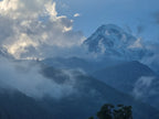 Mount Kazbek snow peak and Caucasus mountain range panoramic landscape photography in Georgia