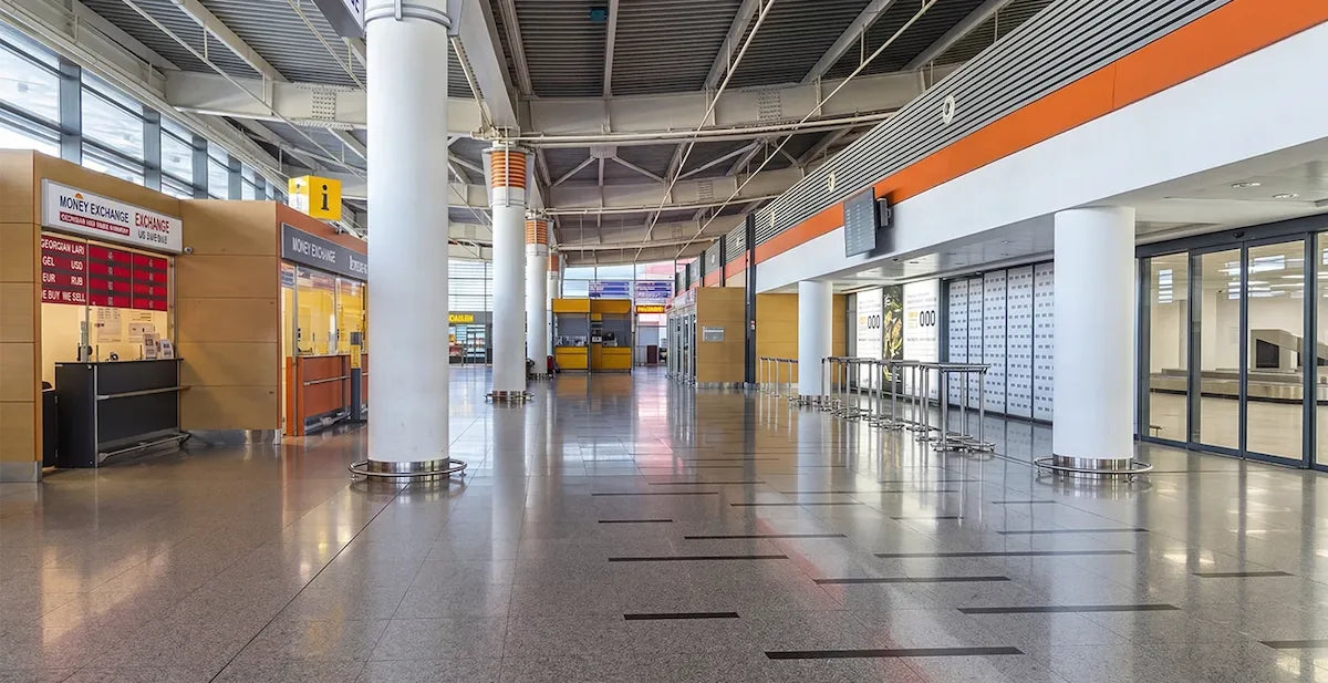 Interior view of Tbilisi International Airport arrival hall (TBS) where our professional drivers meet passengers with personalized nameplates.